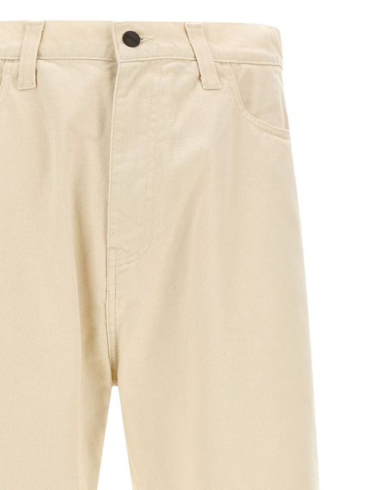 جينز كارهارت WIP MAIN باللون العاجي