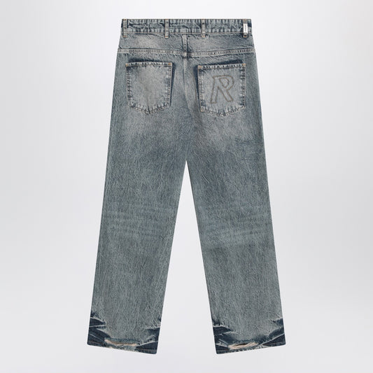 Represent Washed blue jeans with rips