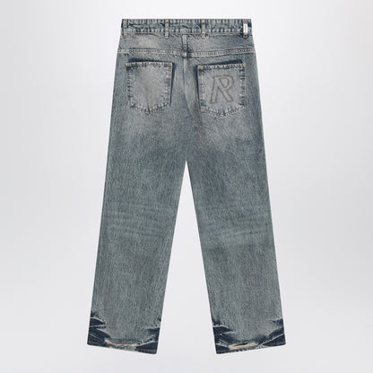 Represent Washed blue jeans with rips